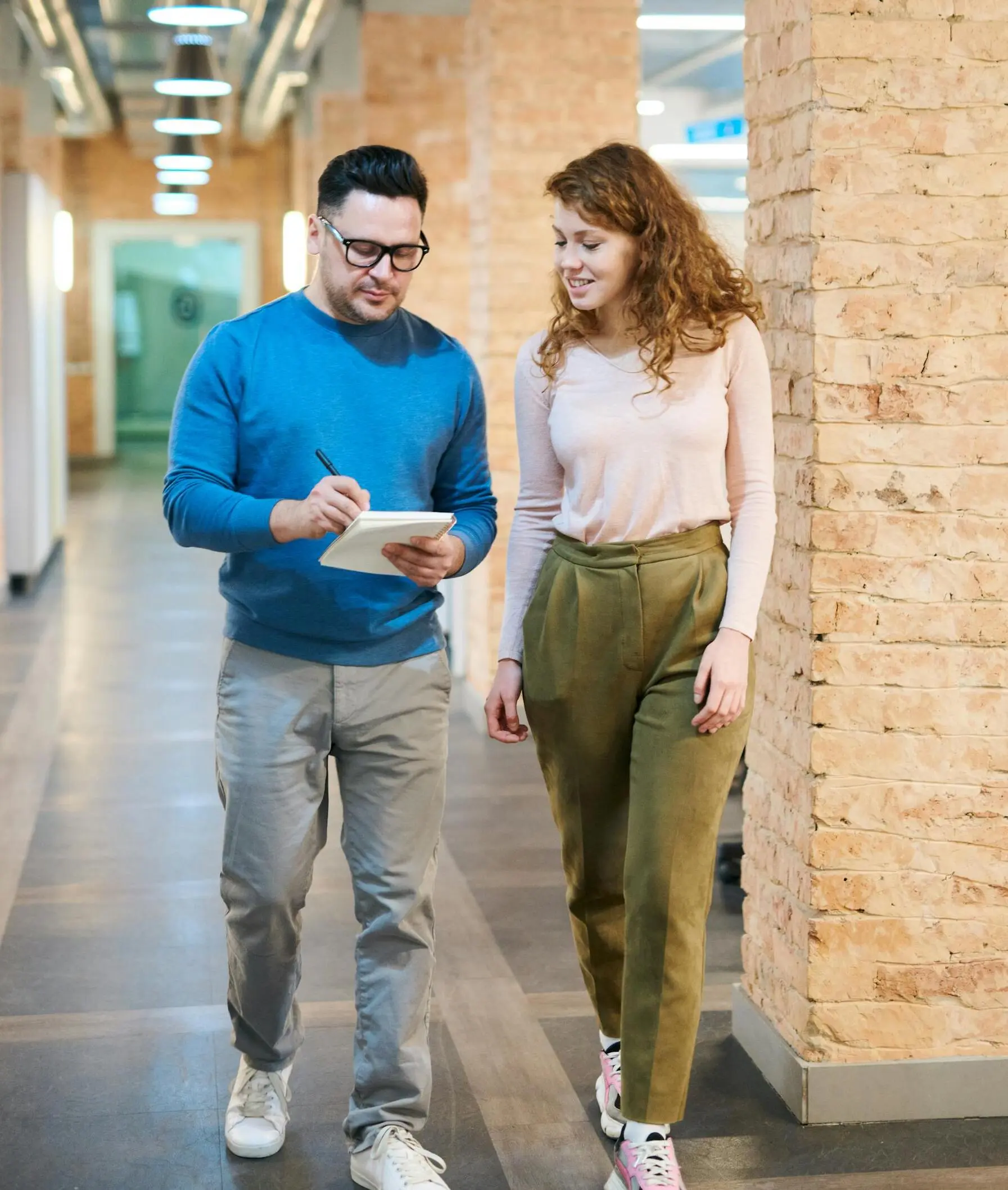 mbitpay employees are discussing in the office